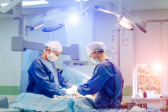 surgery-medical-team-performing-operation-hospital-operating-theater-working-with-surgical-instruments-1