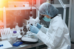 young-female-scientist-using-microscope-microbiological-analysis-medical-science-laboratory-1